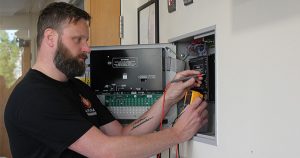 ultimate fire and security engineer testing fire panel