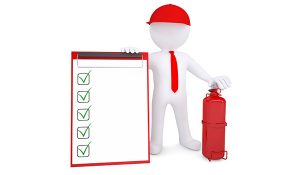 cartoon man with checklist for fire risk assessment